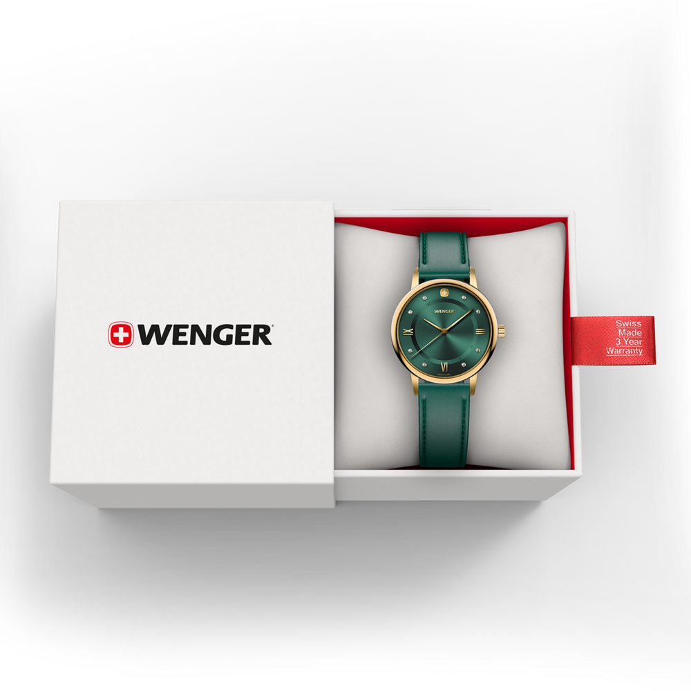 Green Wenger watch in a white box with warranty tag
