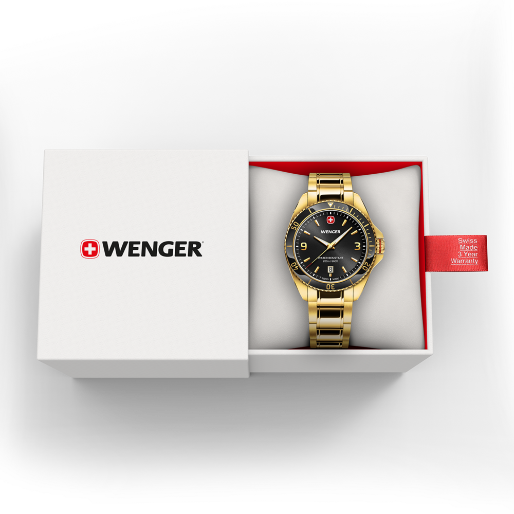 Gold Wenger watch in box with red warranty tag, Swiss made.