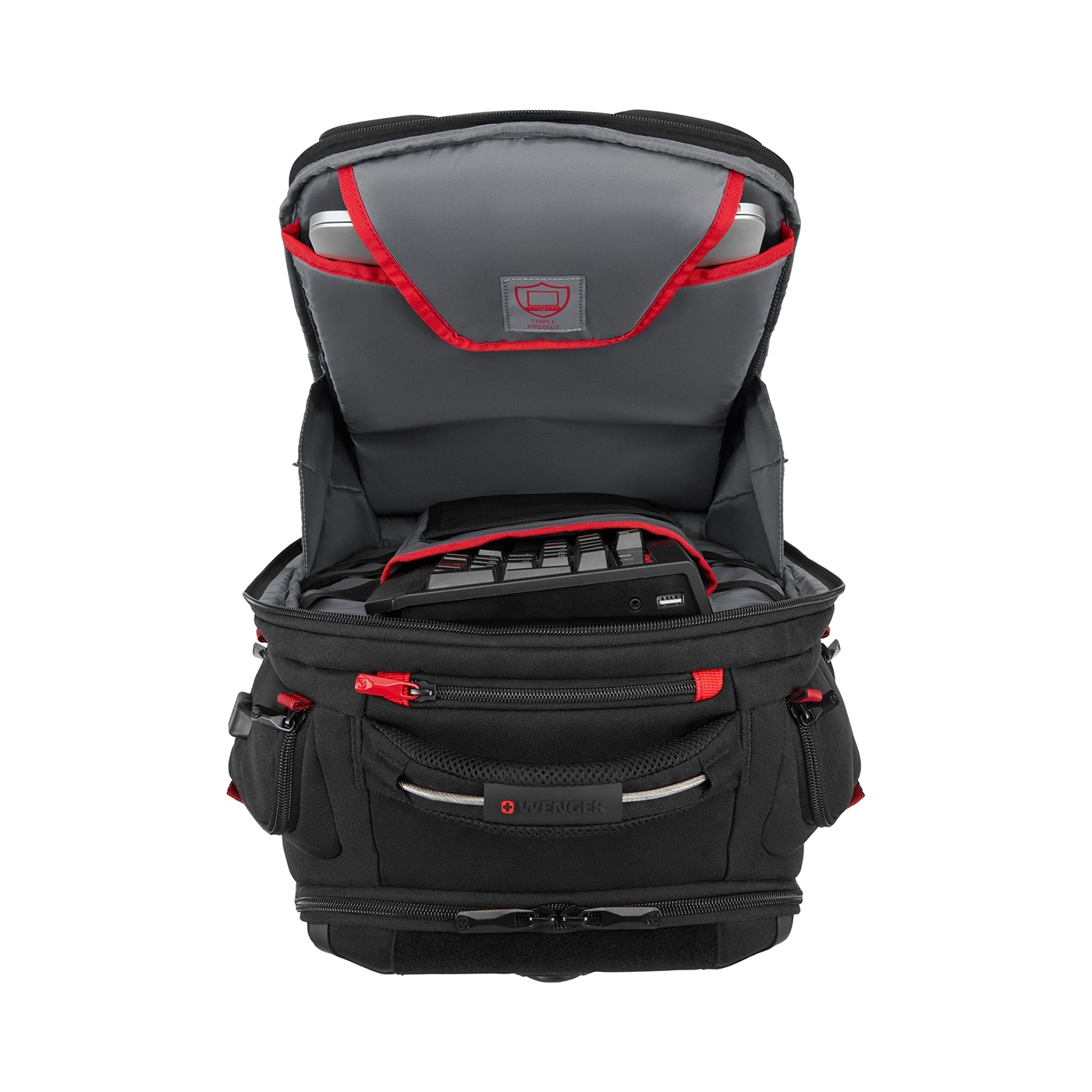Black backpack with red accents, open, with laptop and keyboard inside.