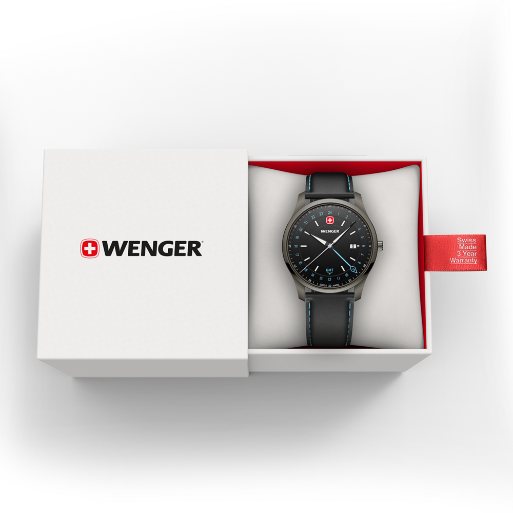 Wenger watch in a gift box with a red warranty tag.