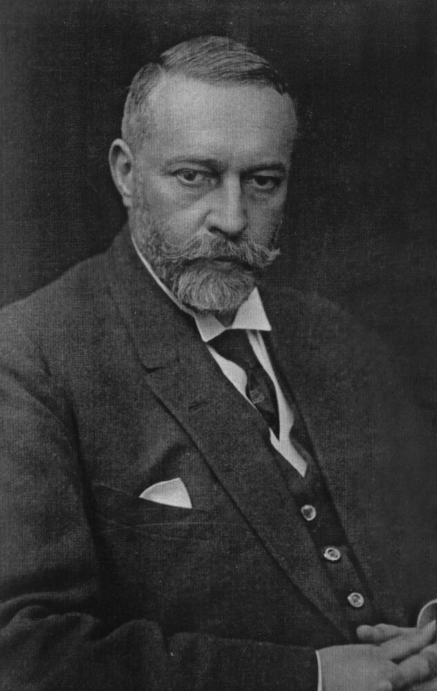 Portrait of a man with a mustache and waistcoat.