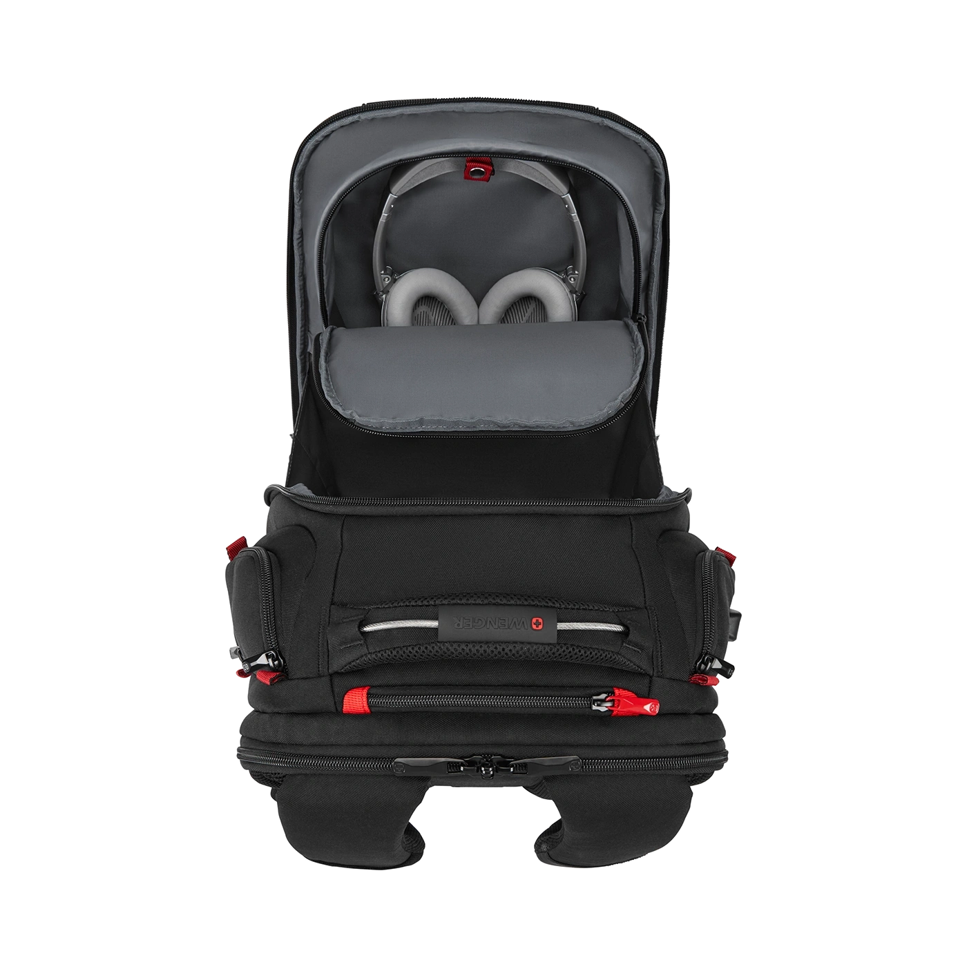 Black backpack with headphones, open, on black background, Wenger brand.