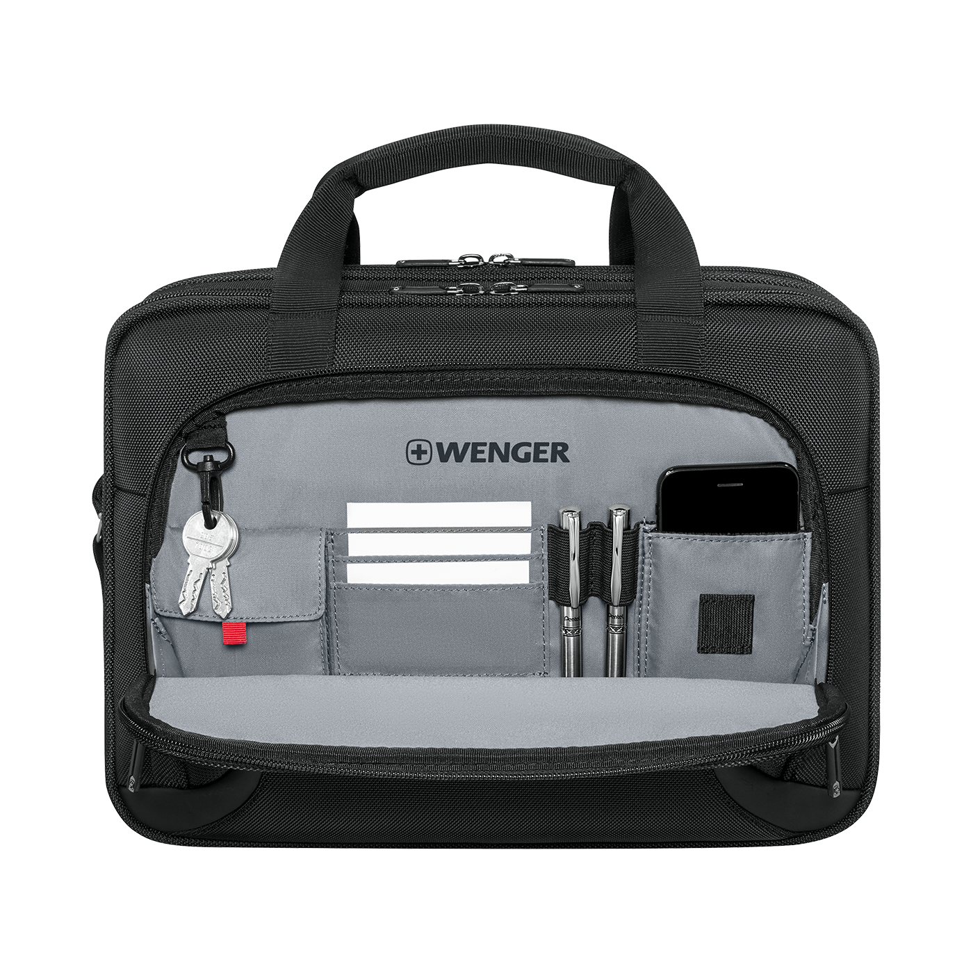 Black briefcase with open compartment, pens, phone, and keys inside.