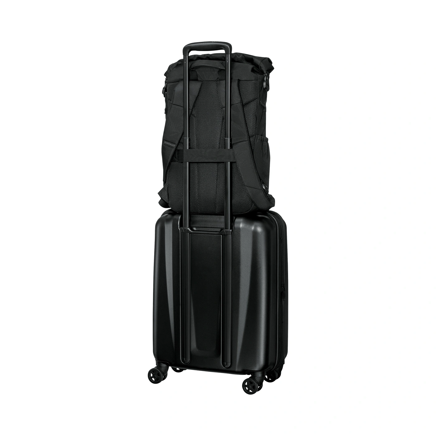 Black backpack on a black rolling suitcase
