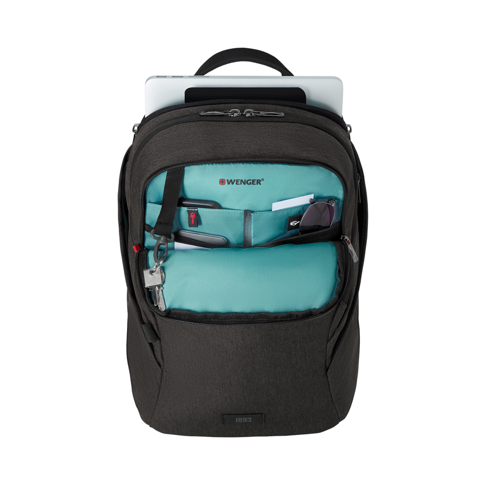 Black backpack with open compartments, laptop, and various accessories inside.