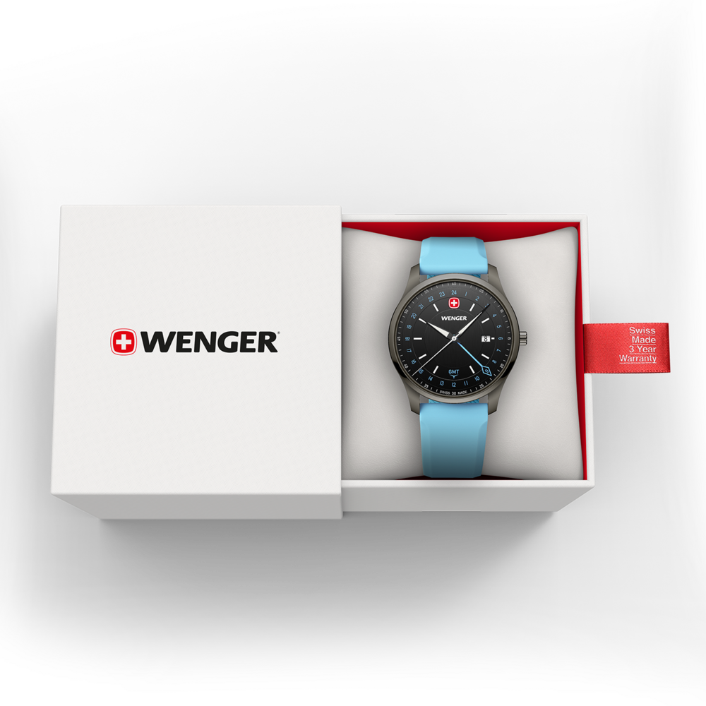 A silver Wenger chronograph watch with a blue strap in a white box with a warranty tag.