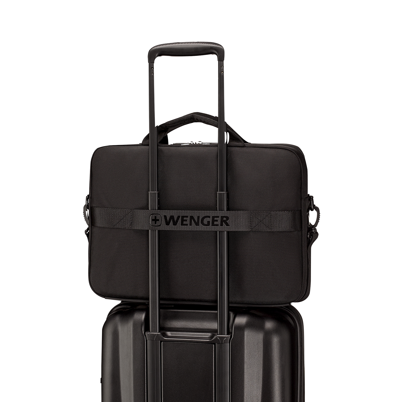 Black briefcase on a black suitcase with handle, Wenger brand.