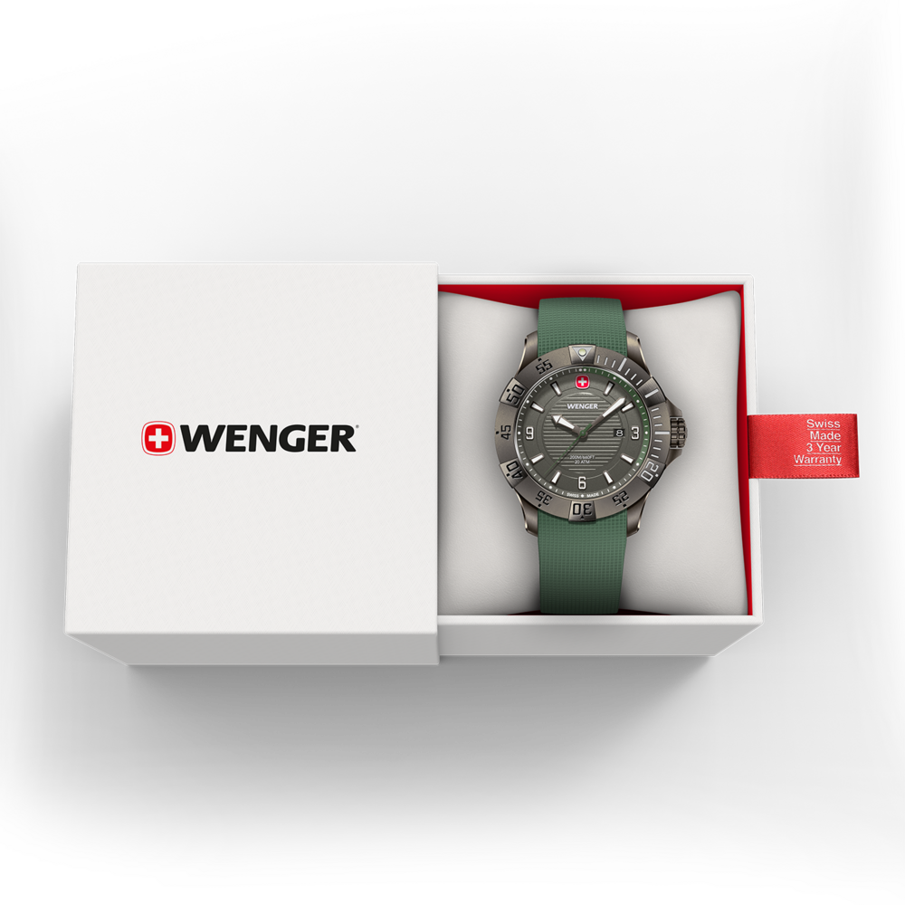 Wenger watch in a box with green strap and warranty information.