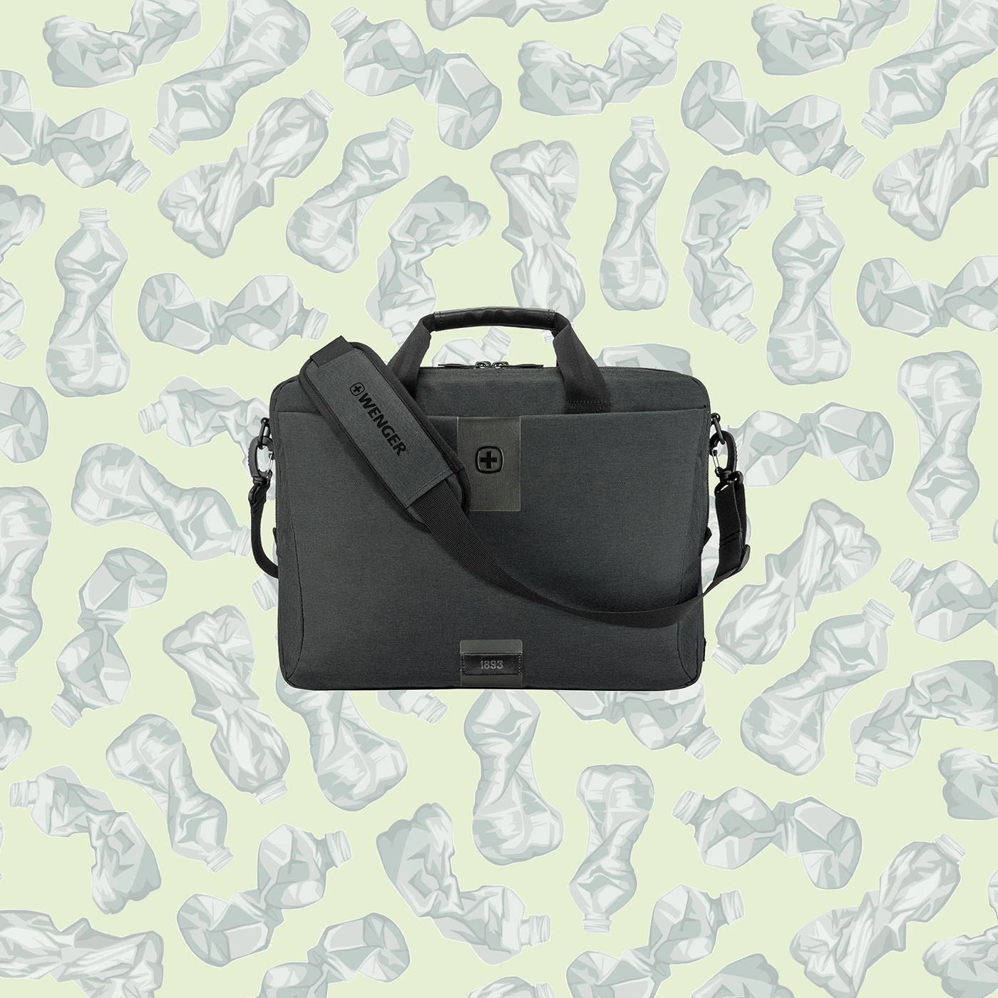 Black bag with shoulder strap in front of crumpled plastic bottles on a light green background.
