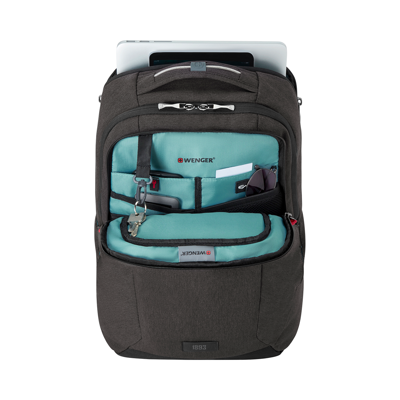 Black backpack with open compartment, tablet, and accessories visible.