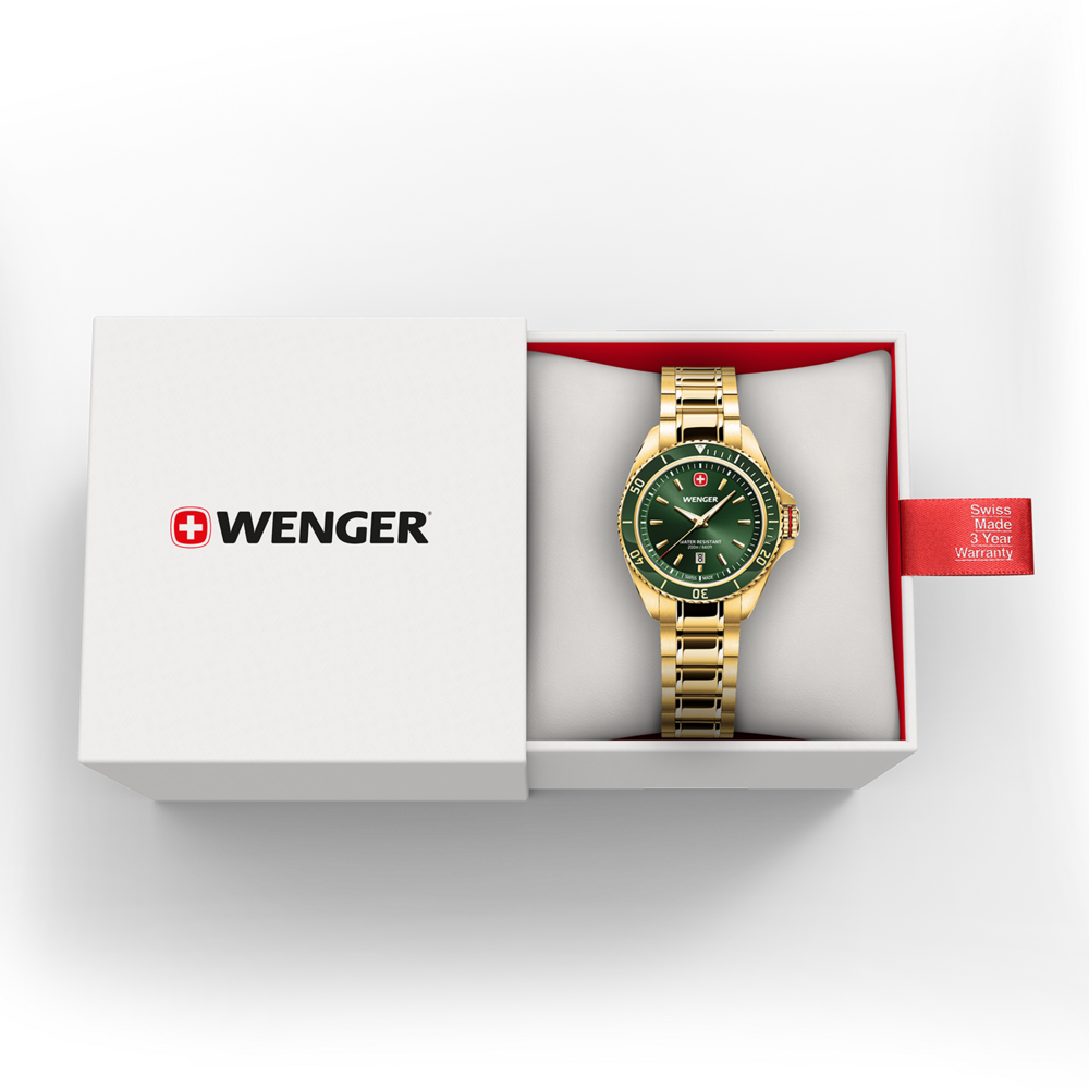 Green Wenger watch with gold bracelet in a white gift box with red accents.