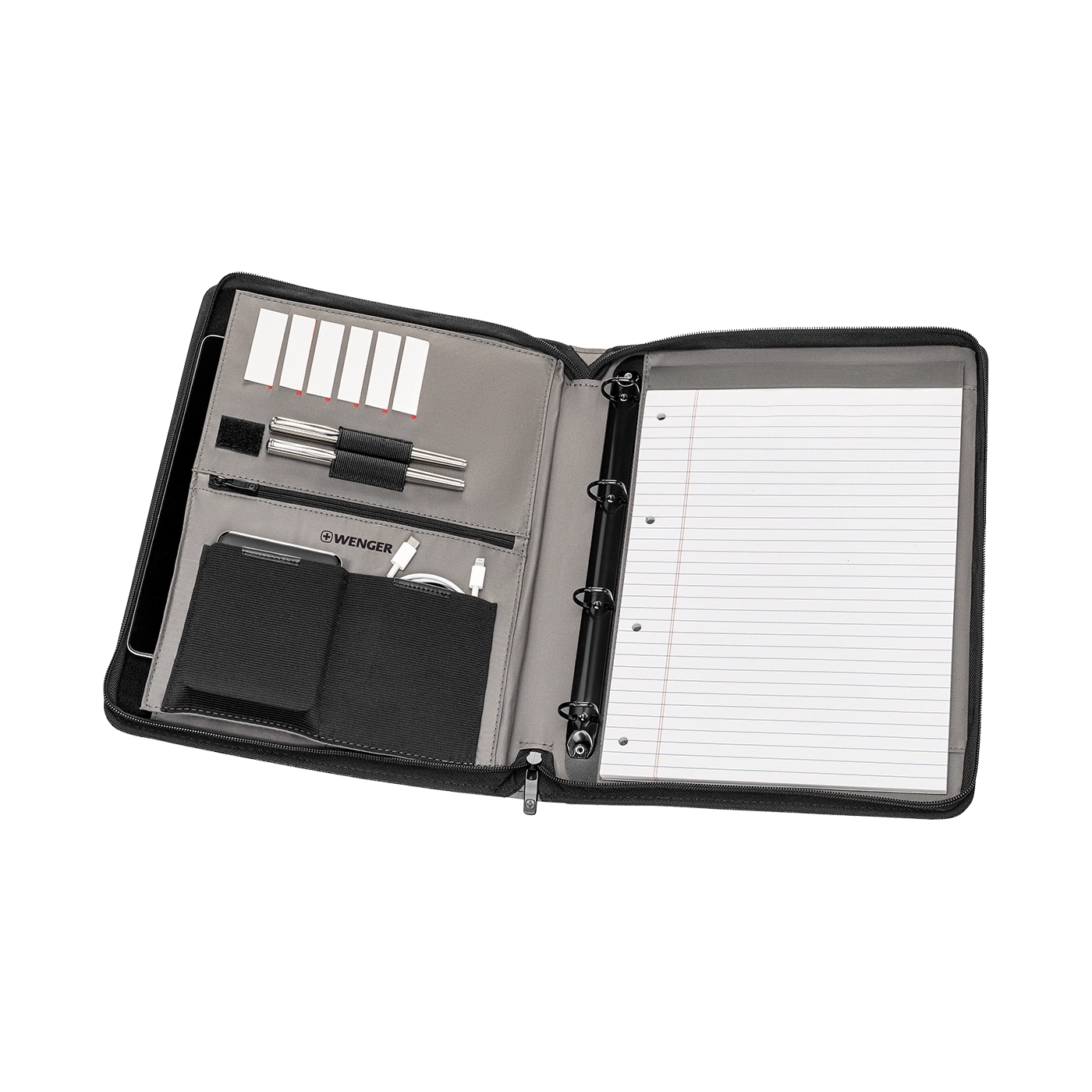 Open black folder with pens, notepad, and various accessories inside.