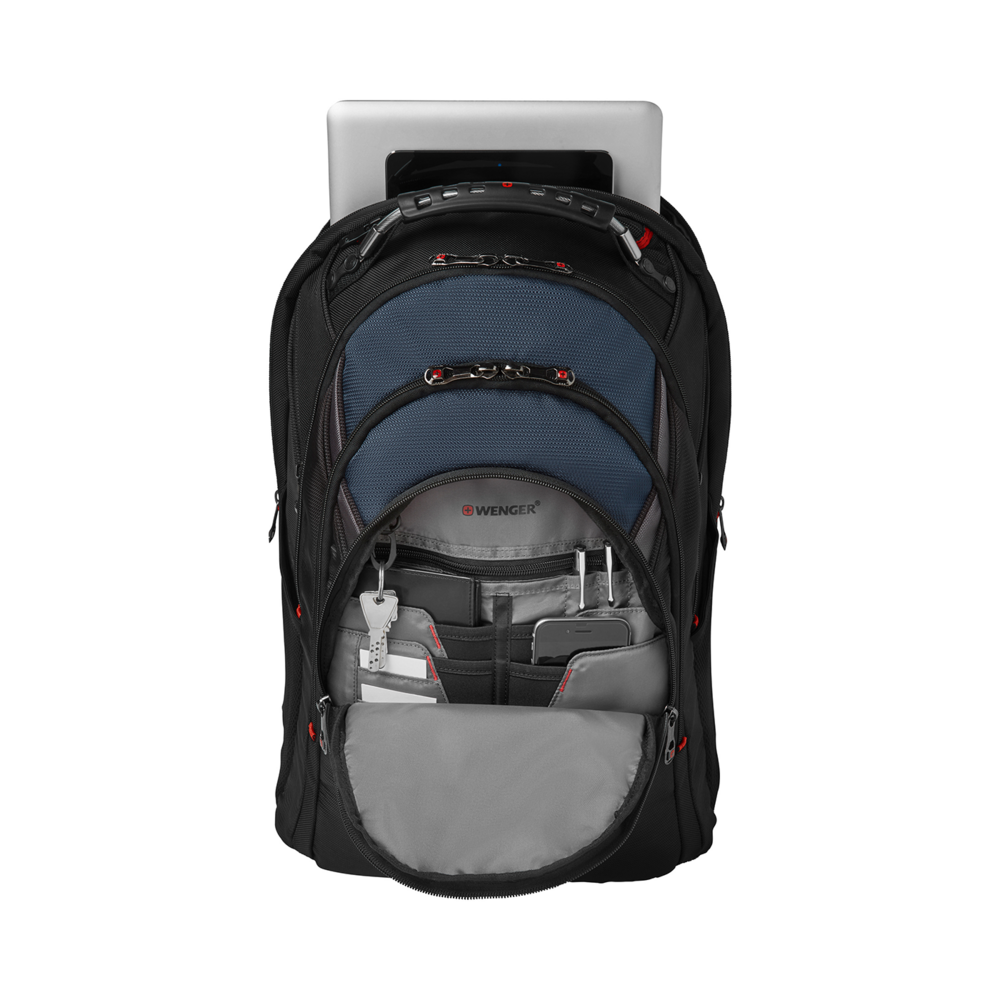 Black backpack with laptop and accessories, open, on a black background.