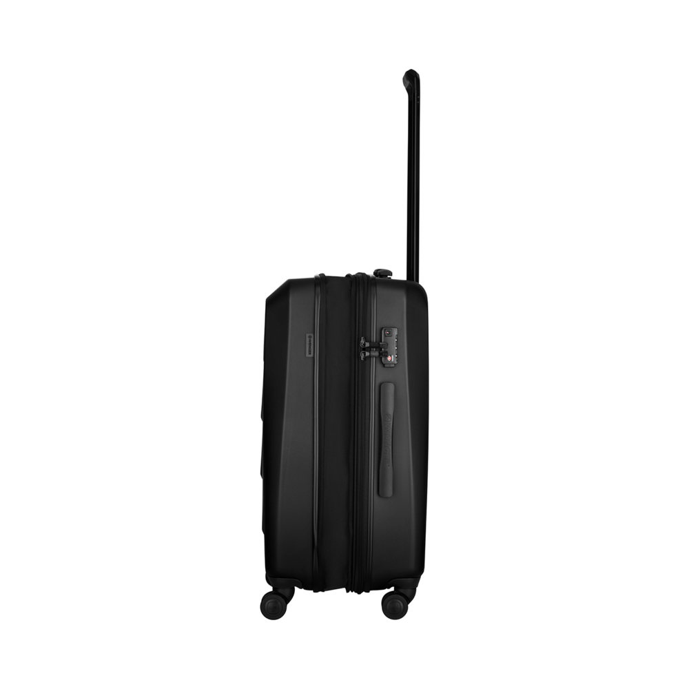Black suitcase with retractable handle and wheels, side view against black background