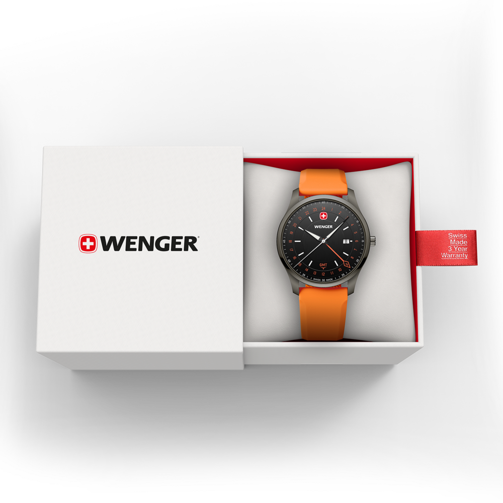 A Wenger wristwatch in orange packaging with a warranty tag.