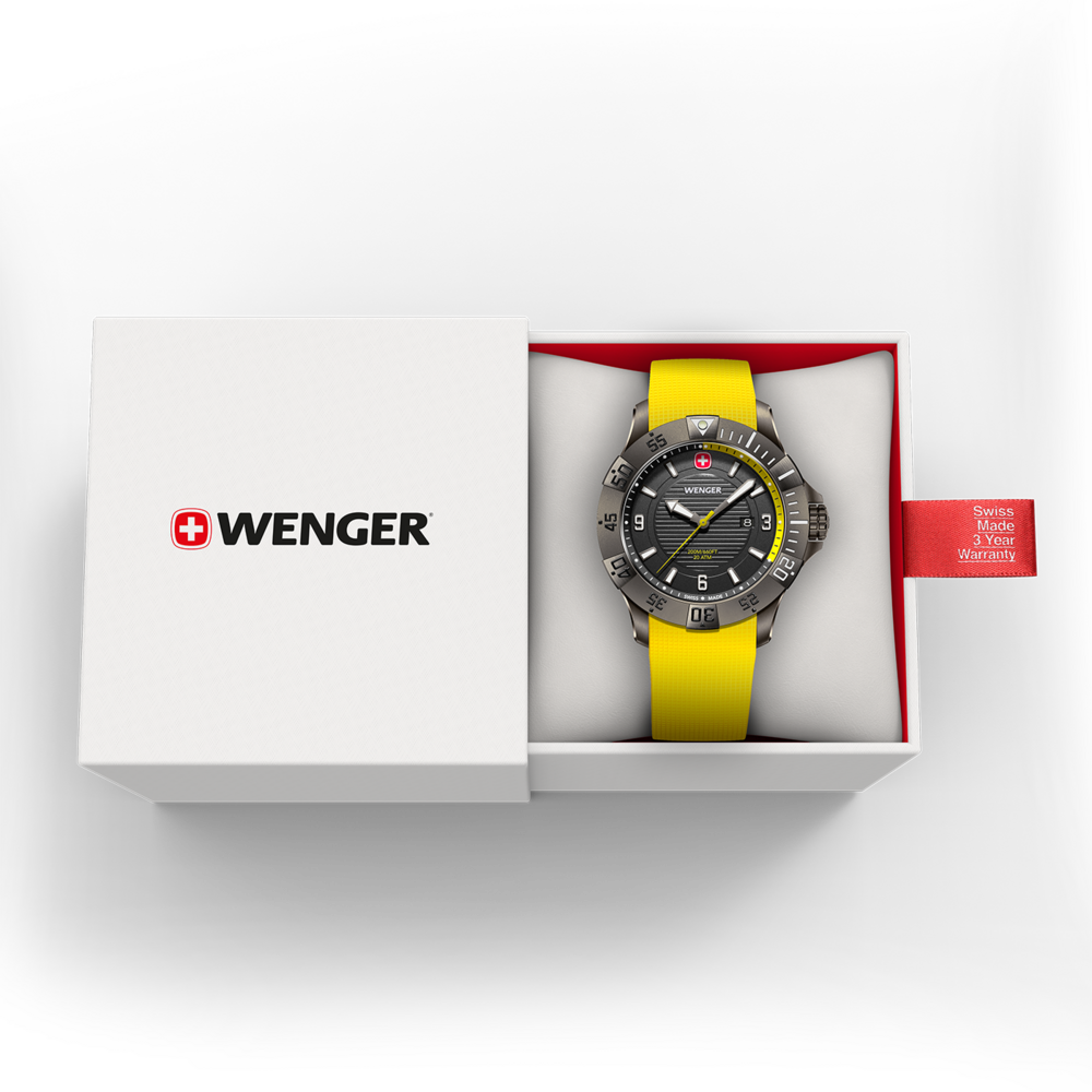 Wenger watch in box with yellow strap and warranty tag