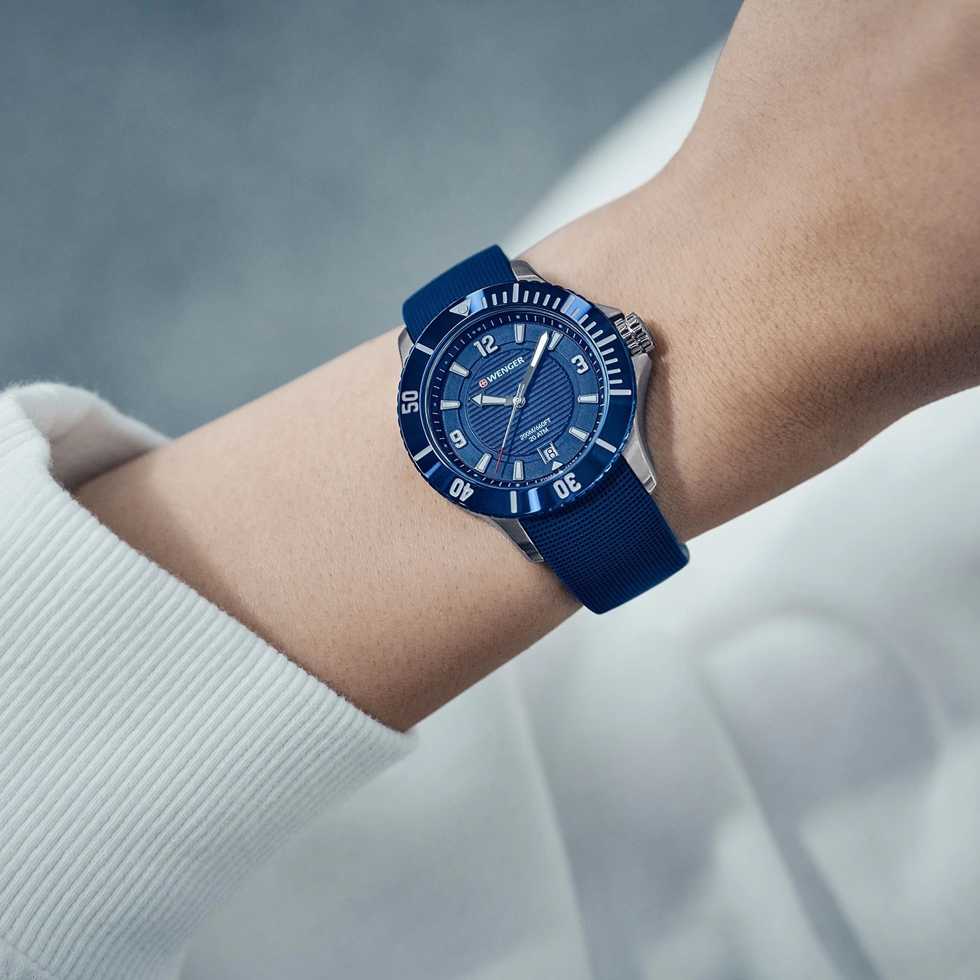 Wristwatch on wrist, blue dial, strap, detail shot, close-up, fashion accessory