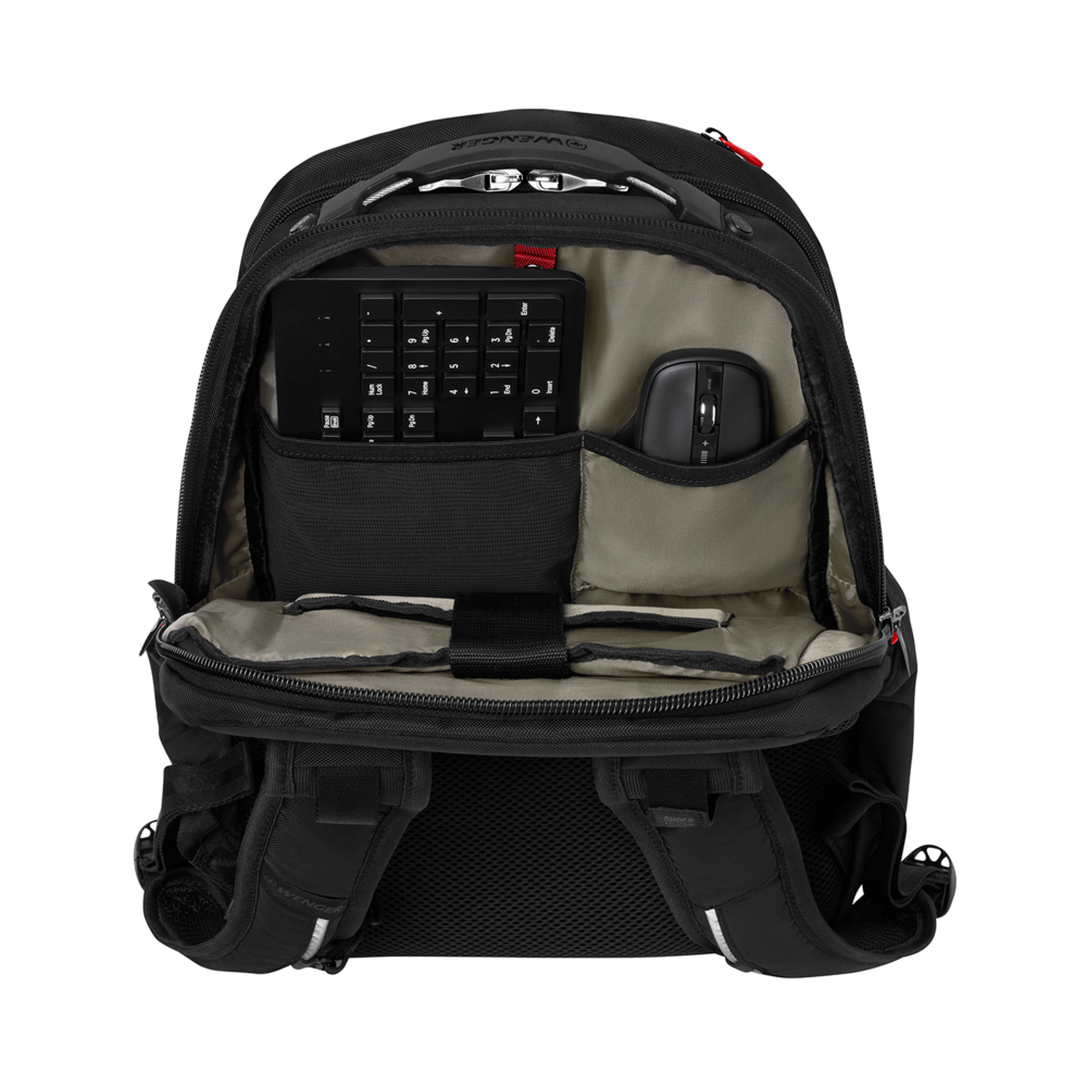 Black backpack with keyboard and mouse, open, on a black background.